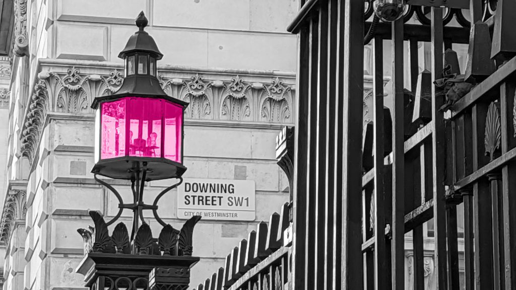 light outside of 10 Downing Street. Light is coloured pink.